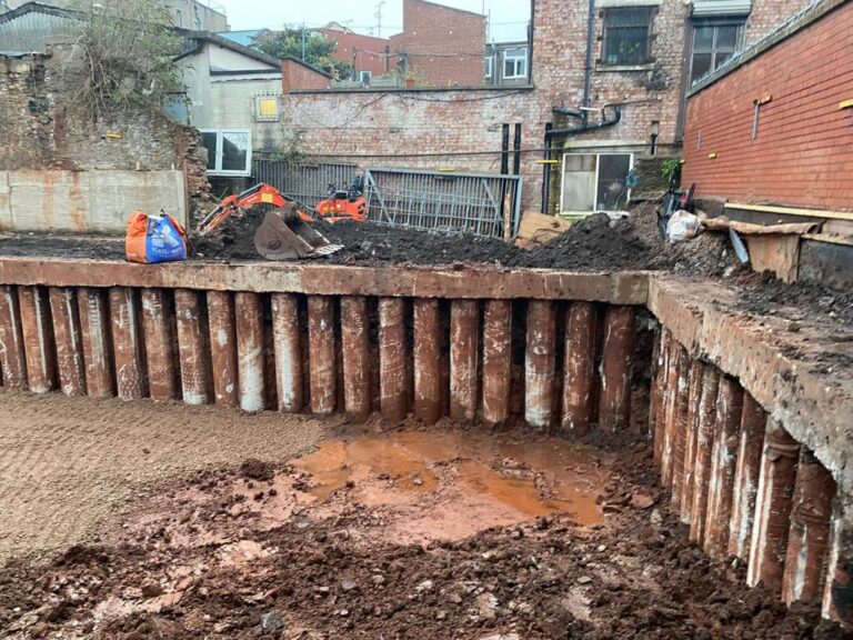 STEEL CASED DRIVEN PILING